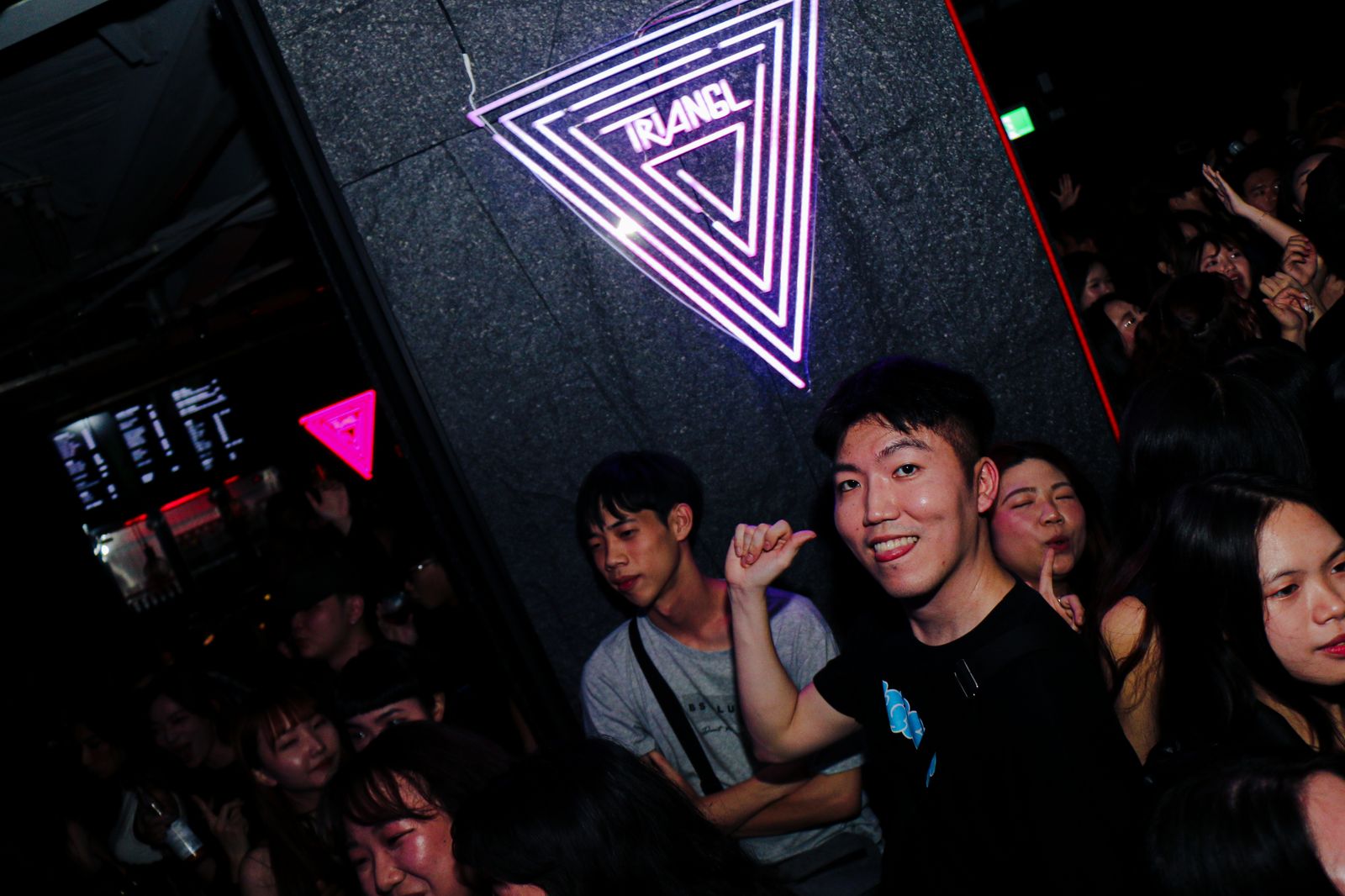 Bar counter atmosphere under the neon triangle sign
